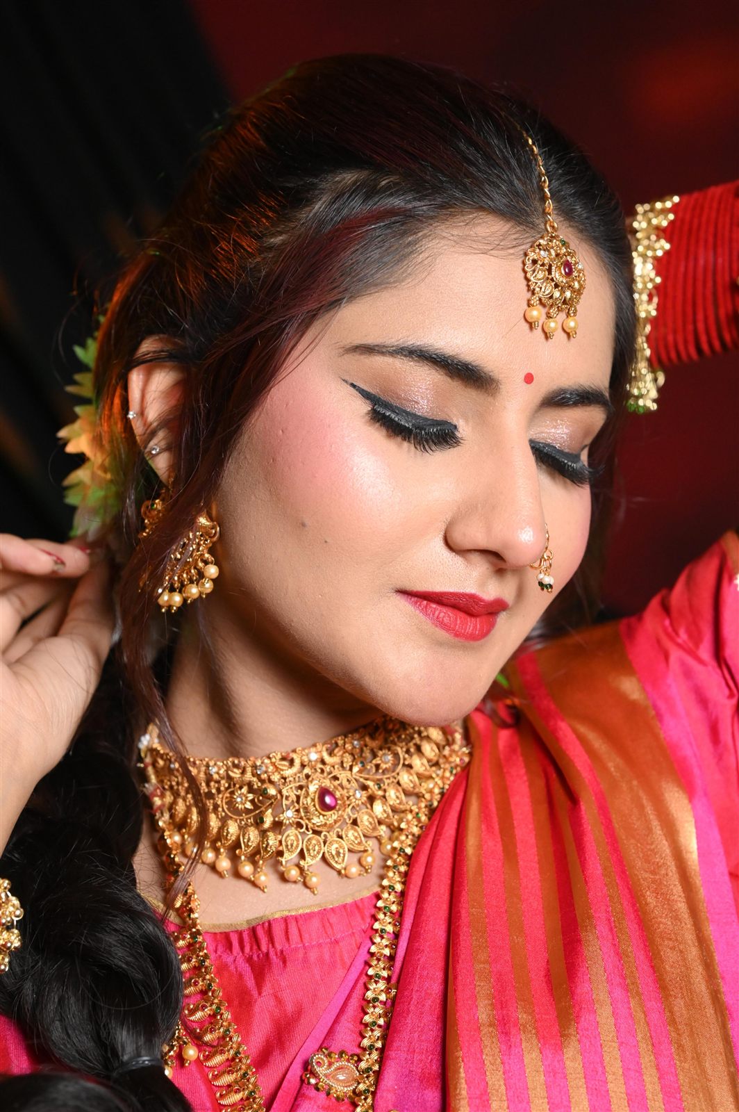 Bridal jewellery and makeup close-up, serene expression