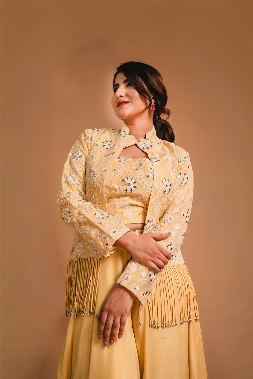 Yellow fringed jacket set, three-quarter look