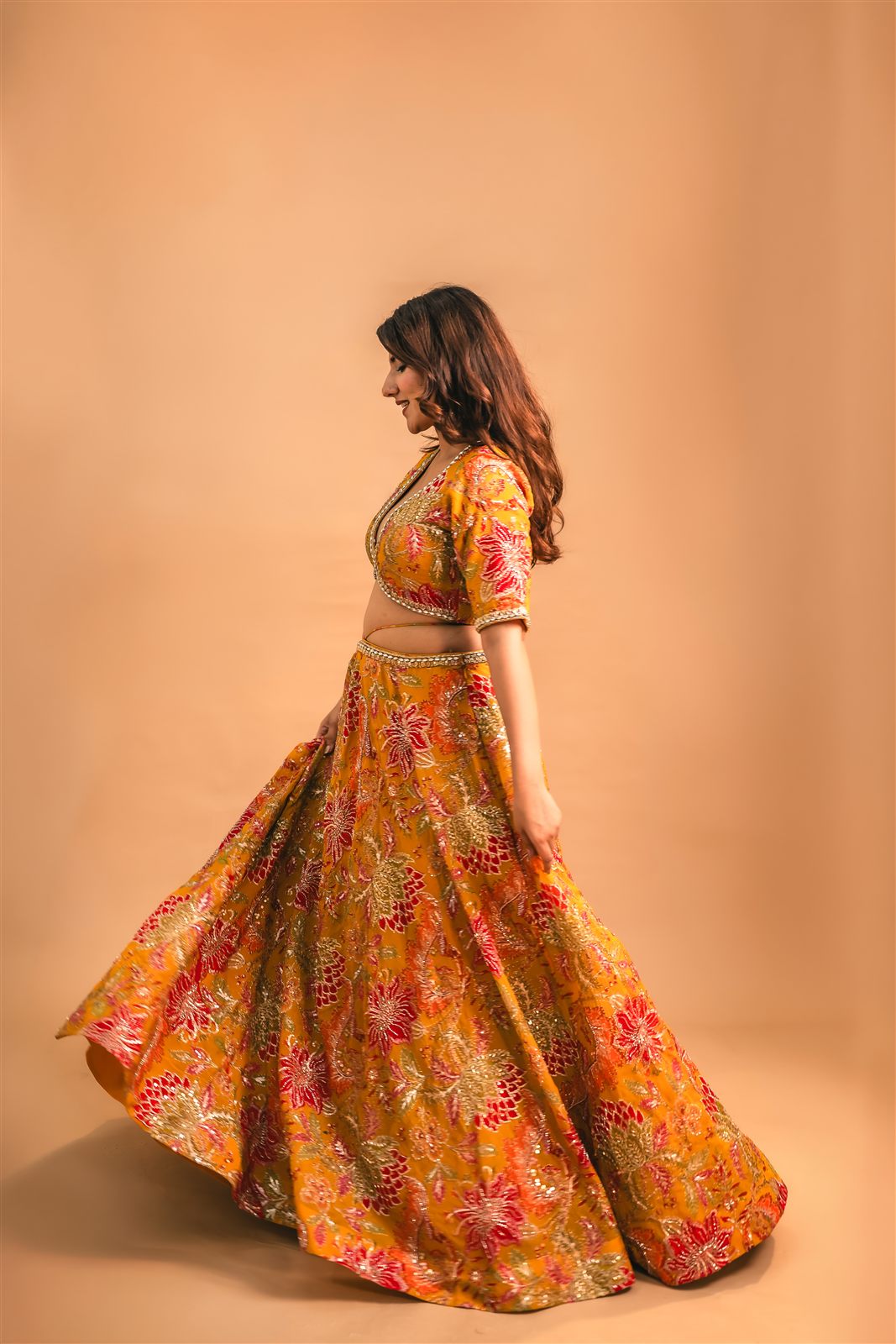 Mustard and gold floral lehenga, twirling