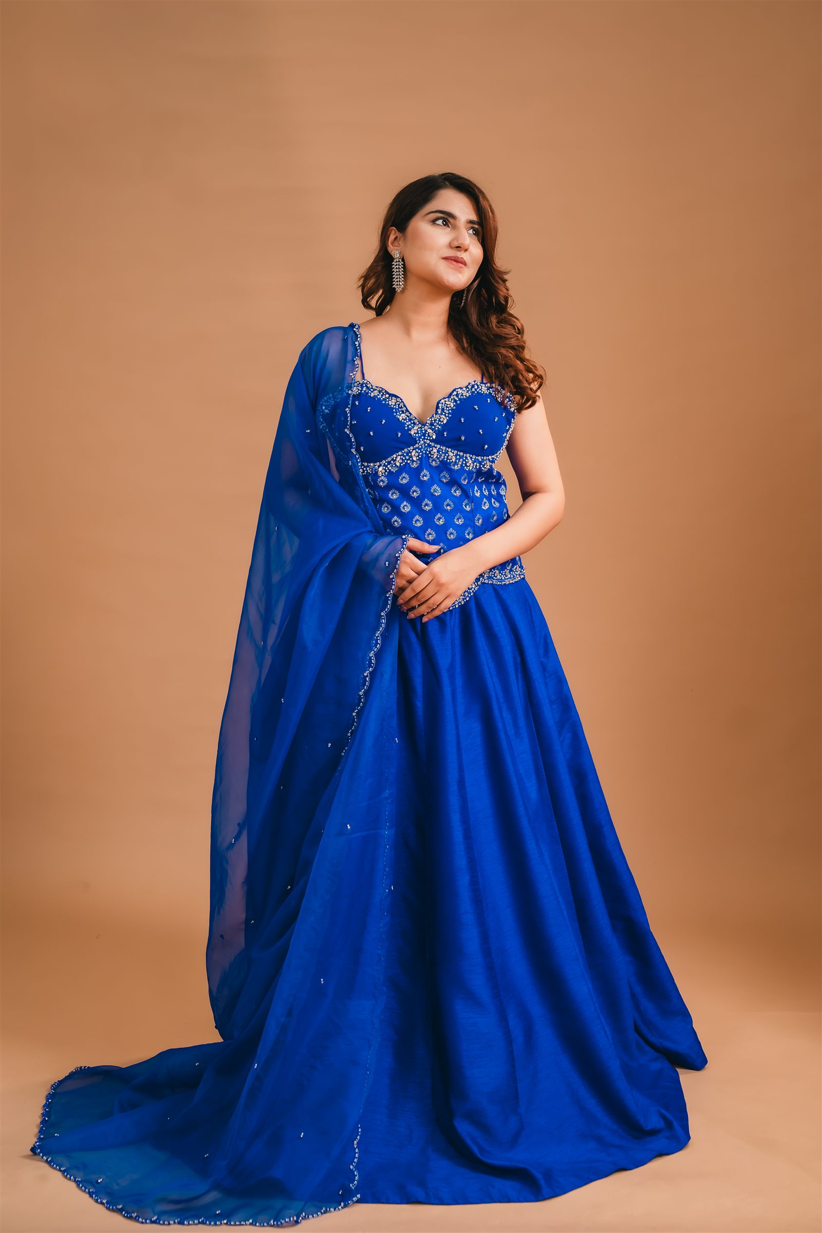 Manjeri Kothiyal in a royal blue gown with dupatta